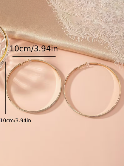 Exaggerated Hoops in Gold and Silver, earrings, styled view