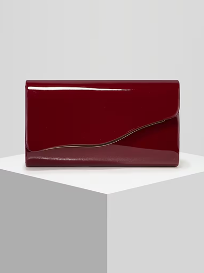 Sleek Curve Evening Bag in Burgundy