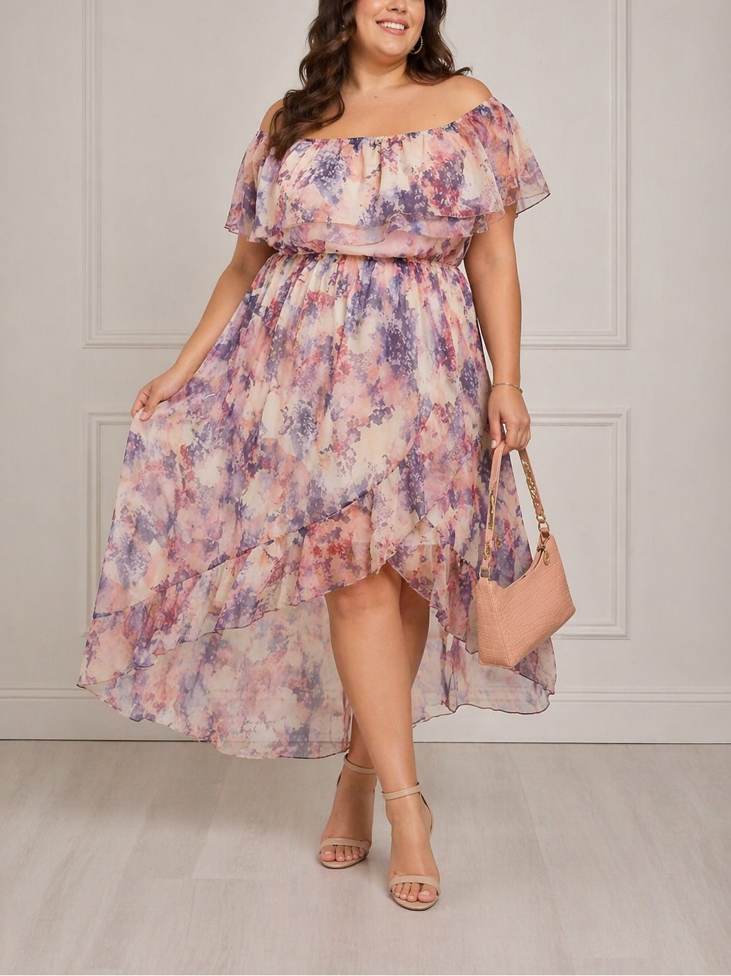 Woman wearing a floral off-shoulder dress with a plain background